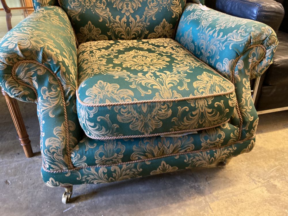 A green and cream brocade upholstered lounge armchair, width 98cm, depth 100cm, height 96cm